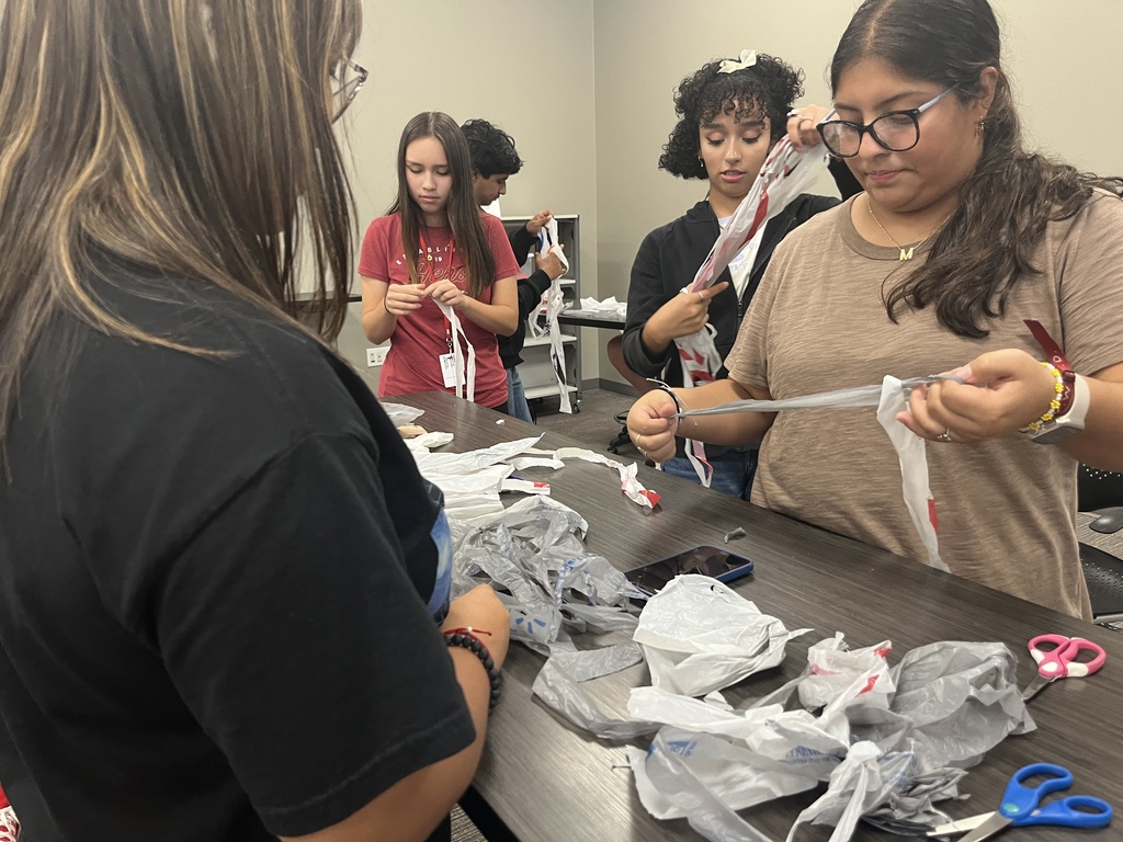 Tyler Legacy Key club members making "Plarn"