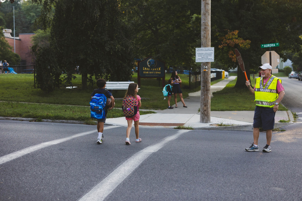 students crossing street