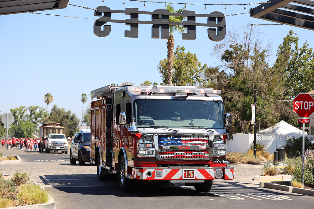 Firetruck drives under "Ceres" sign