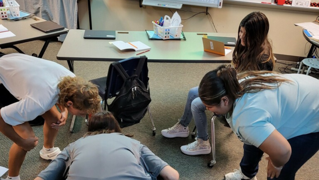 4 girls in game mode in the classroom