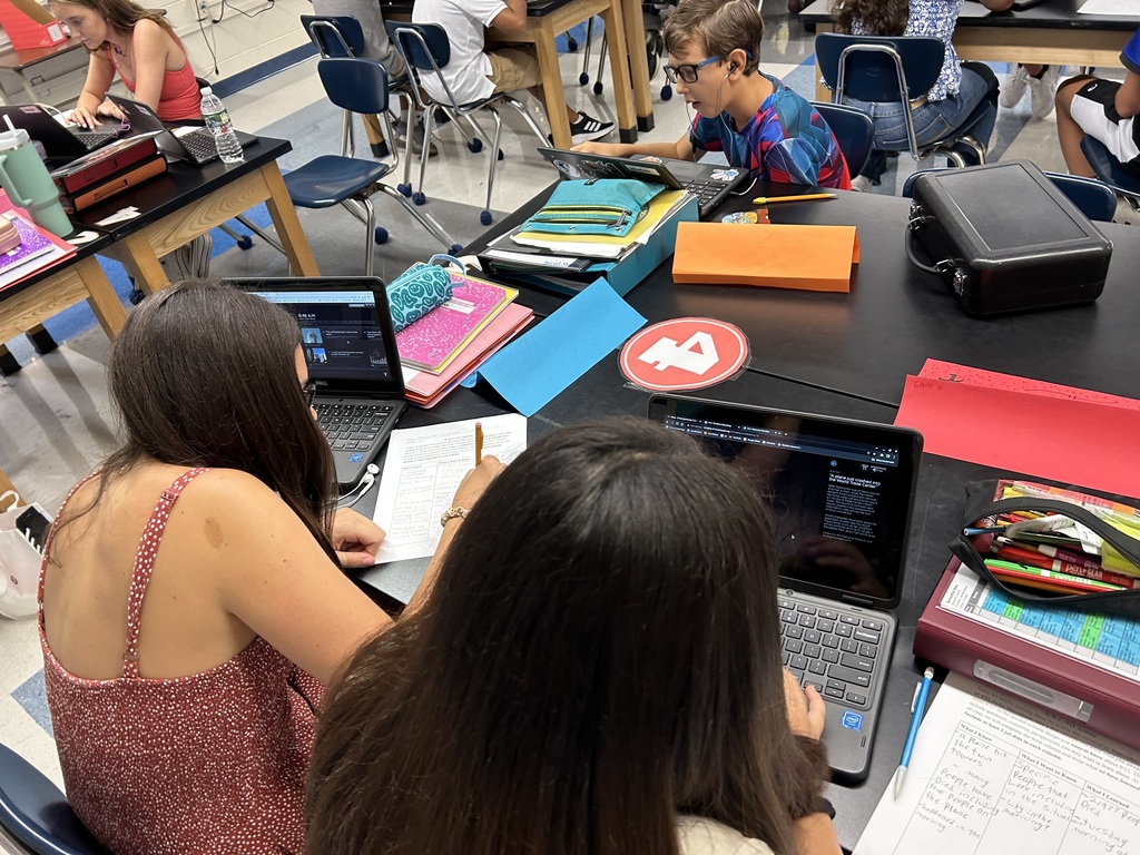 Students examining 9/11 timeline and completing KWL charts