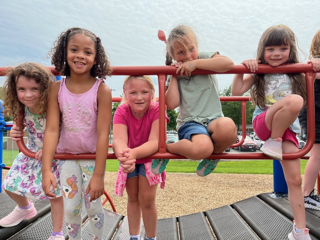 First graders play on the playground.