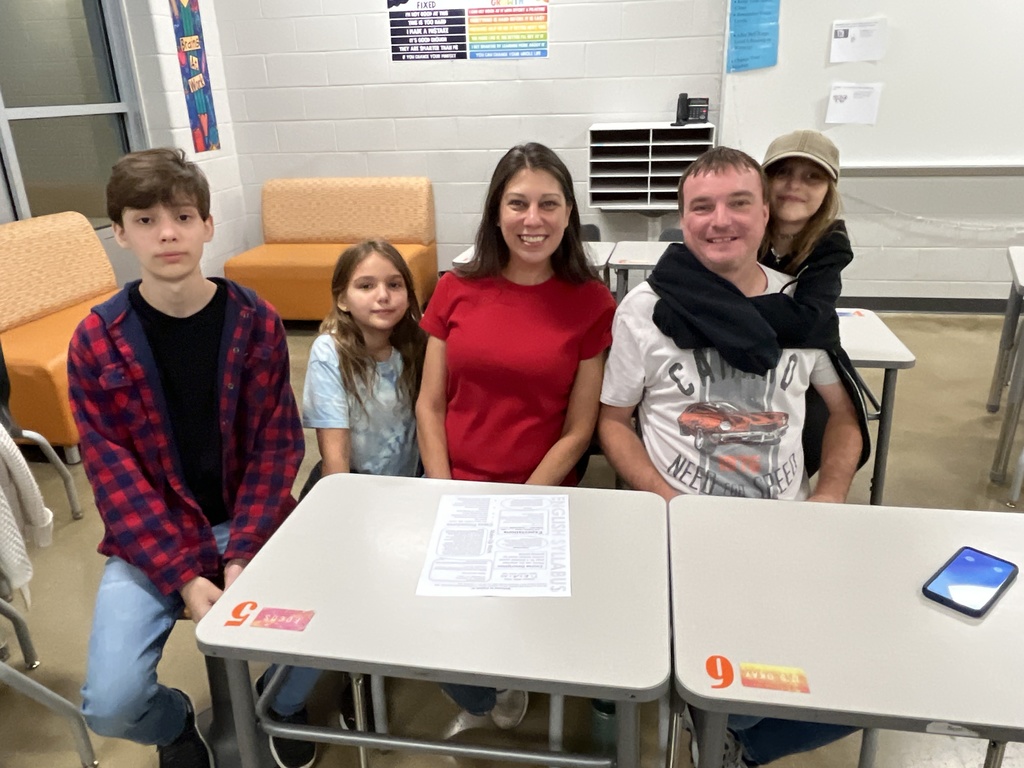 Parents and students attend back to school night.