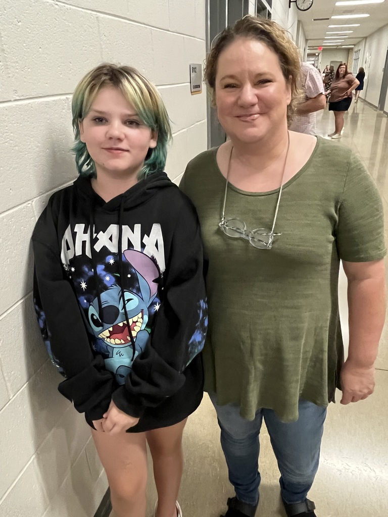 Parents and students attend back to school night.