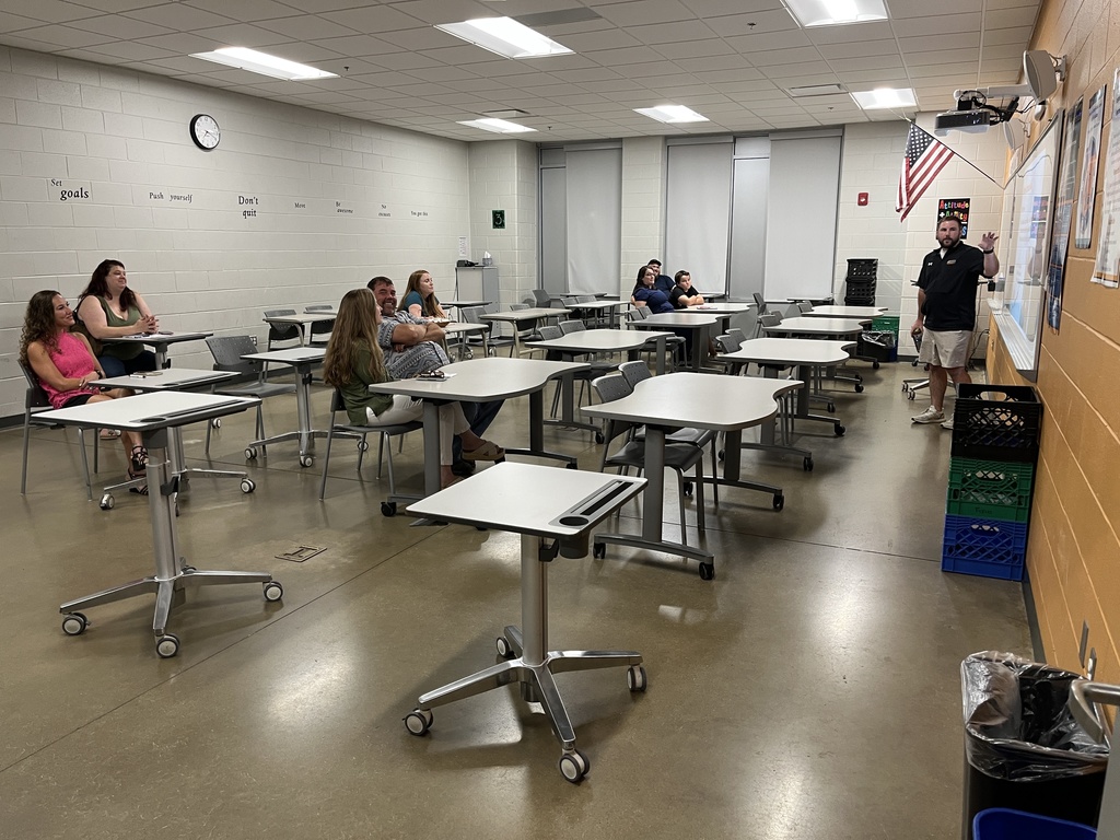 Parents and students attend back to school night.