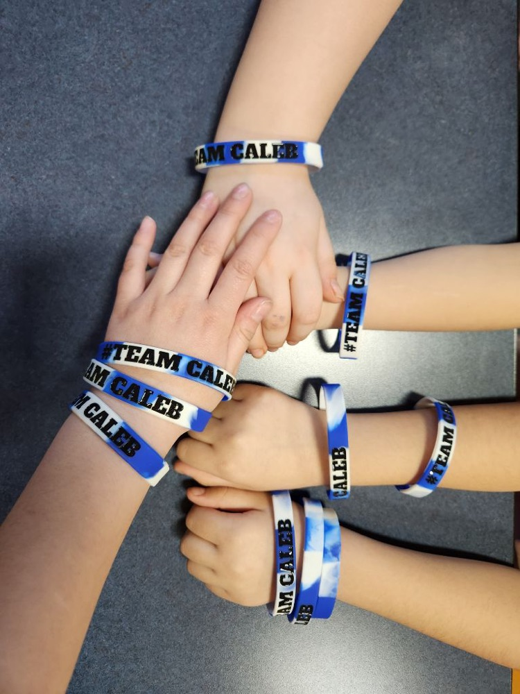 kids hands with bracelets 