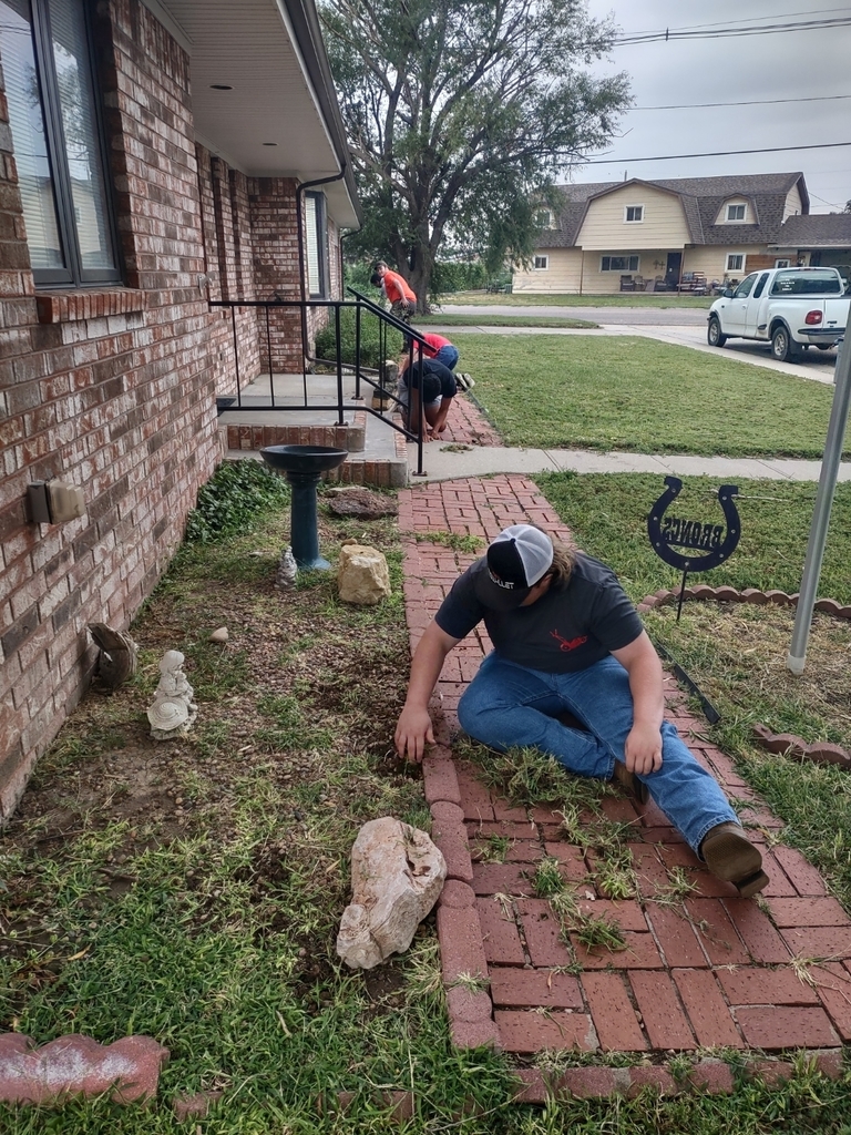 students doing yard work 2