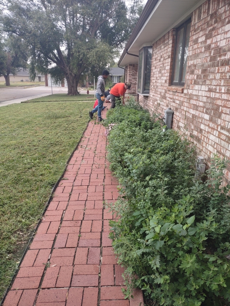 students doing yard work 1