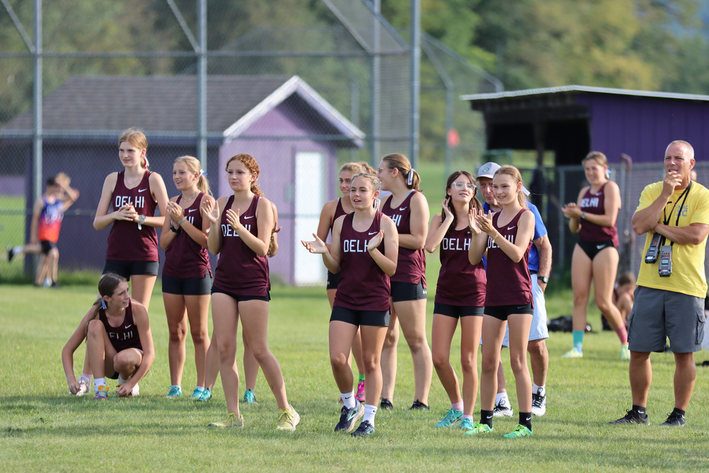 girls applauding at cross country meet