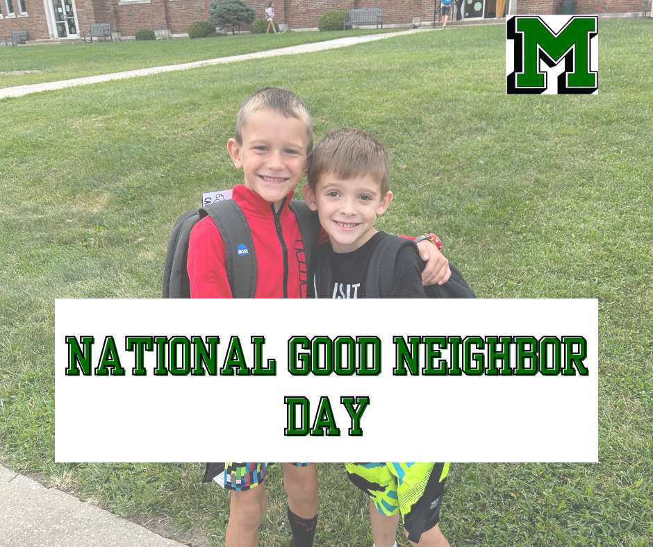 Two students hug each other on national good neighbor day