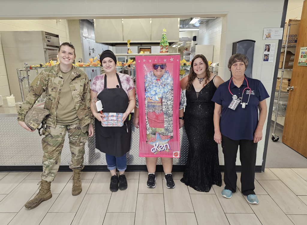 kitchen staff dressed up as barbies