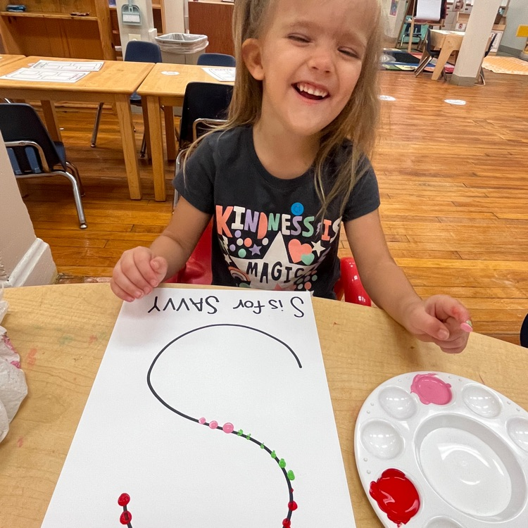 Ms. Brynn’s preschool class having fun exploring Finger painting!