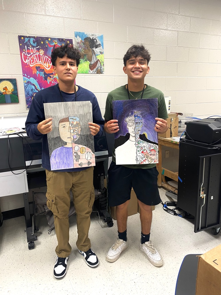 Art 2 students with their identity self-portraits ✏️🎨🖍️