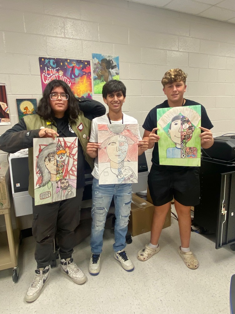 Art 2 students with their identity self-portraits ✏️🎨🖍️