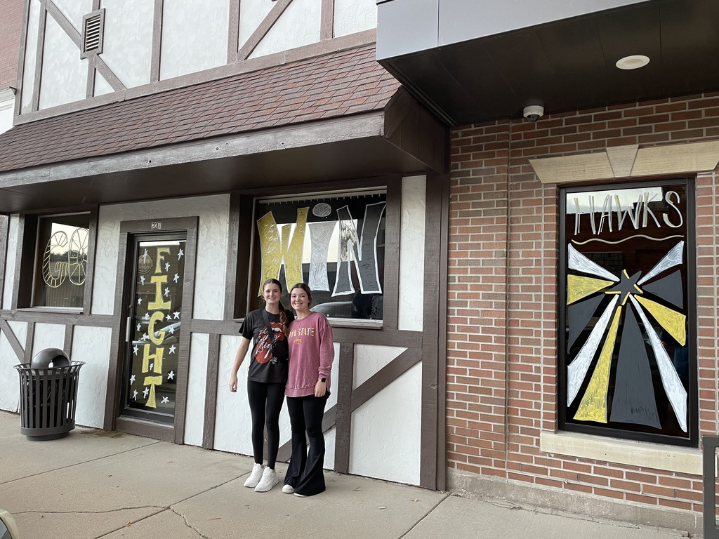 Brooklyn and Adelyn decorating windows