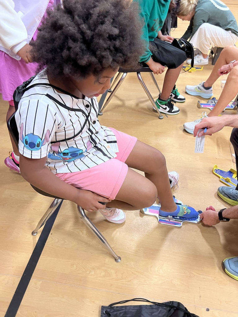 Glen Lea student gets fitted for sneakers