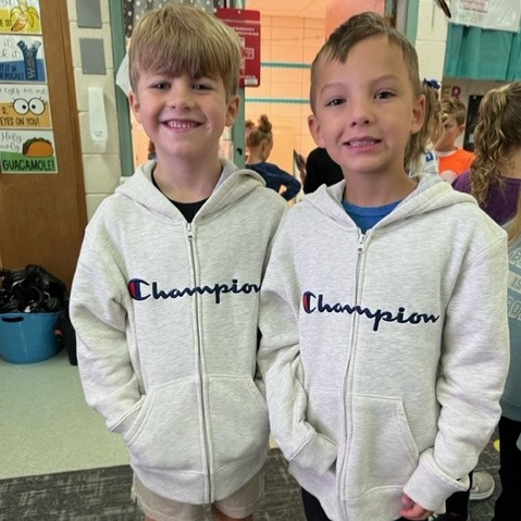 2 boys dressed alike
