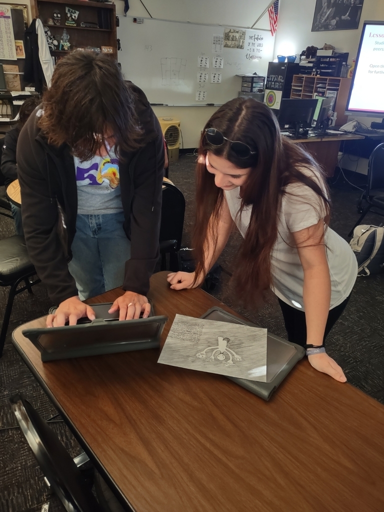 Students are sharing their projects.