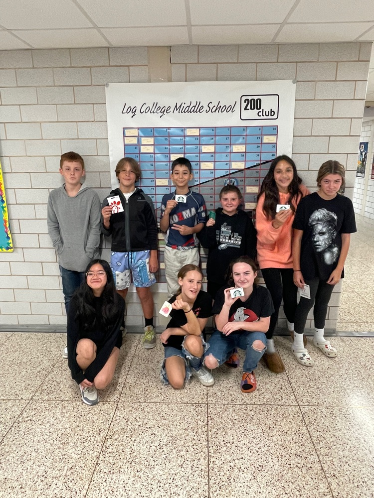 students standing with prizes