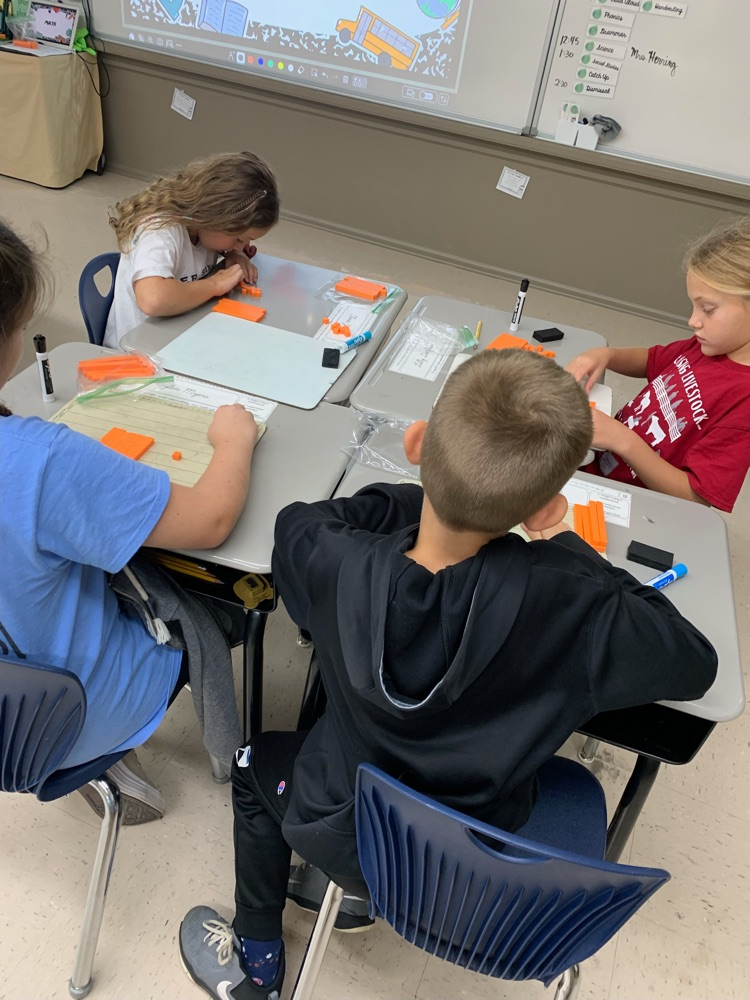 students with manipulatives