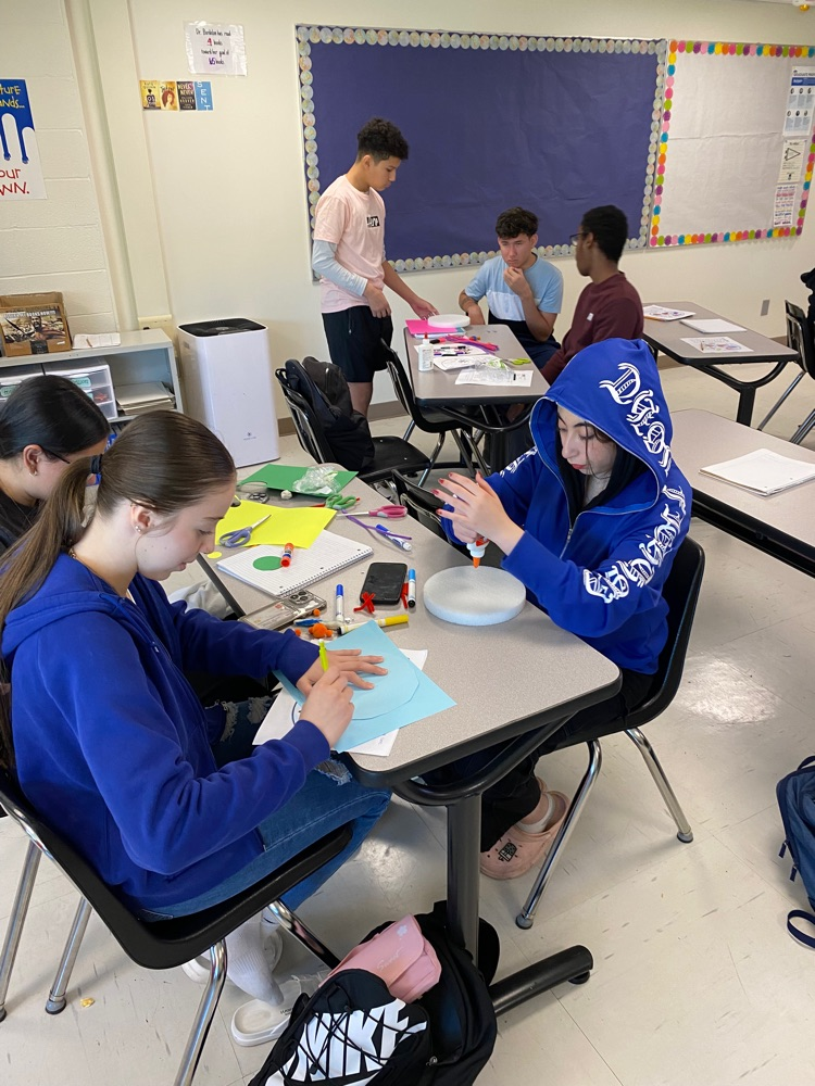students building a cell model
