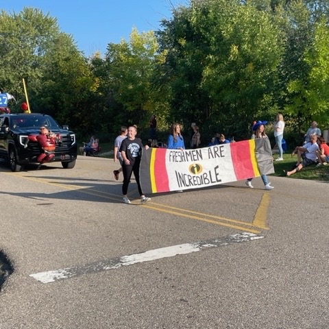 freshmen in homecoming parade