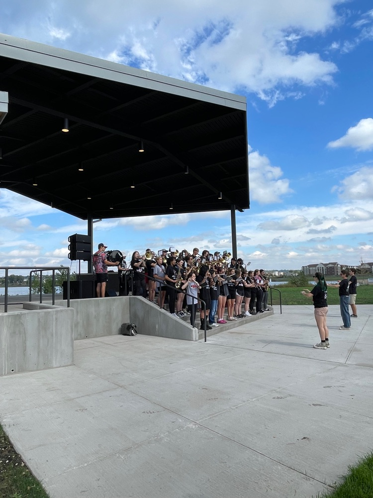 a sunny sky over the new cascade lake park amphitheater where the JM band is playing 