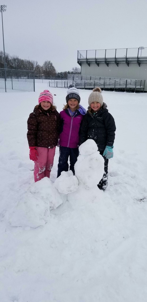 Elementary students enjoying the first snow.