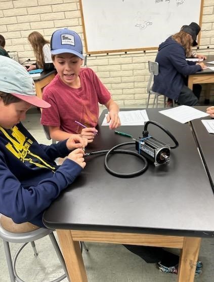 Students learning about motors