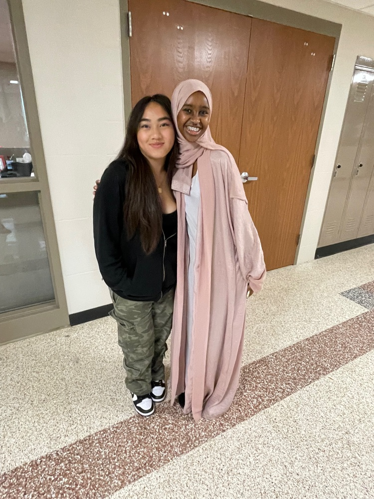 camo and pink represented by 2 female students