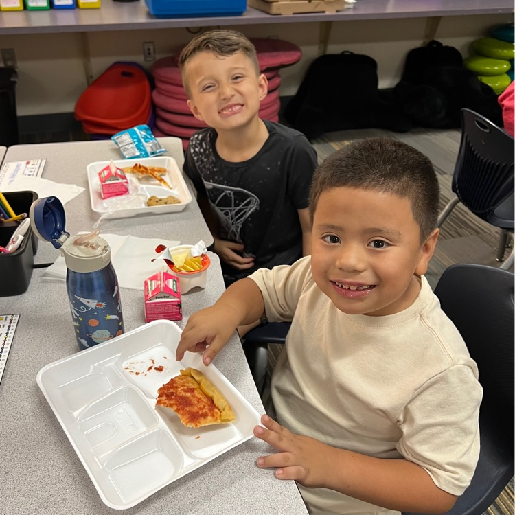 Kids enjoying pizza party