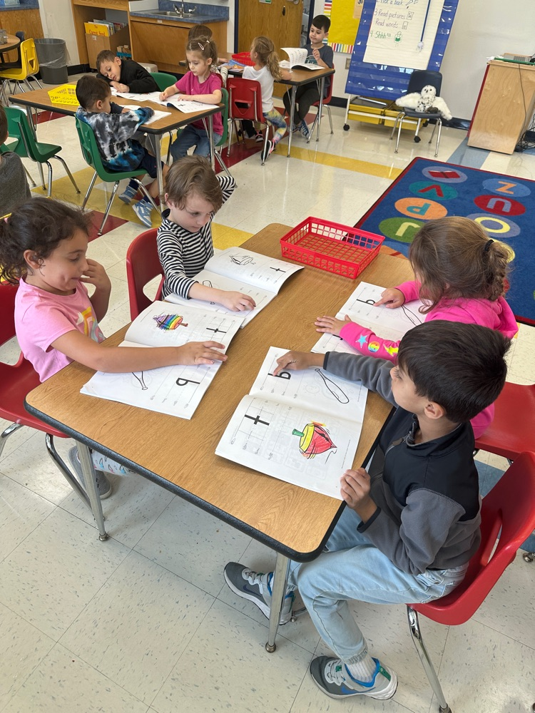 students practice letter formation
