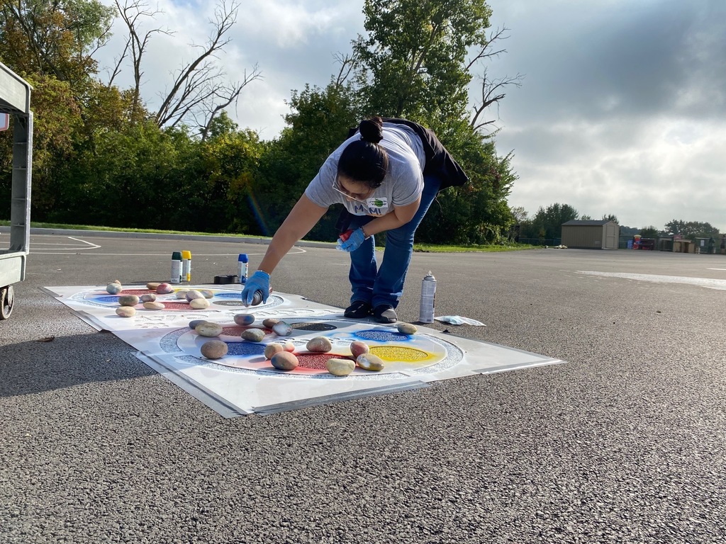 painting new playground games on the playground