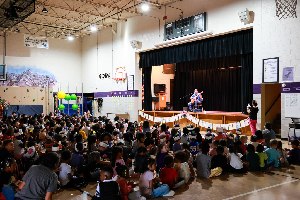 Edgar Cruz performs on guitar