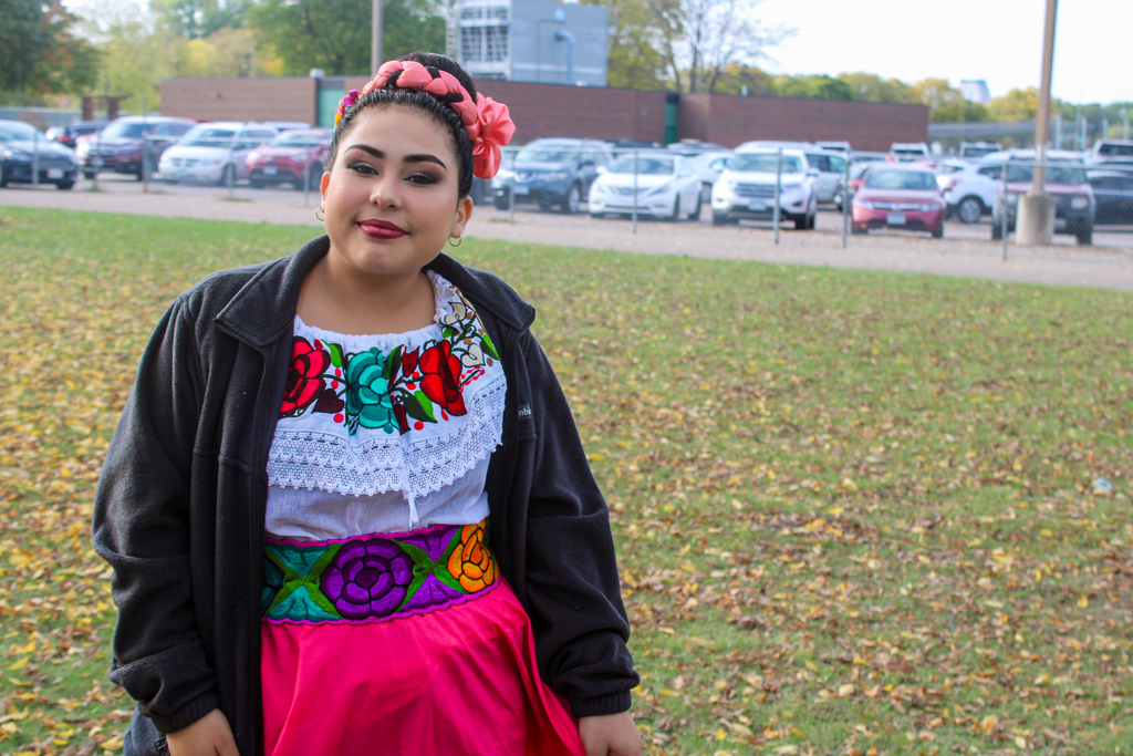 One of the dance performers posing for a photo before their performance.