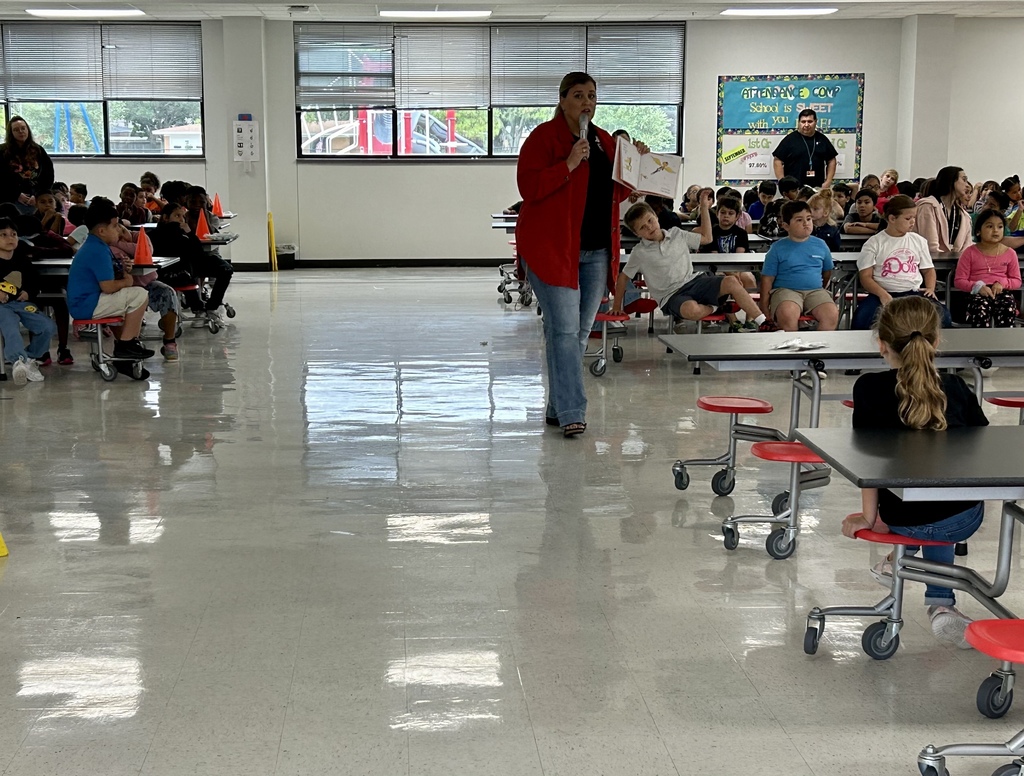principal reading book to kids