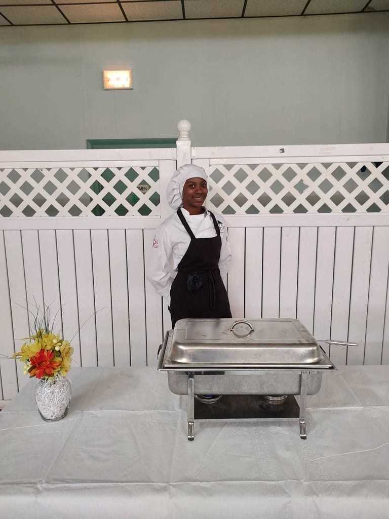 culinary arts student ready to serve lunch