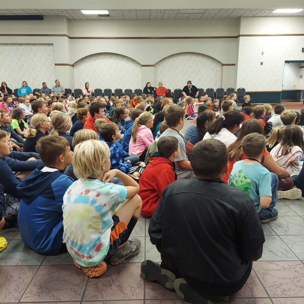 Student listening to a speaker