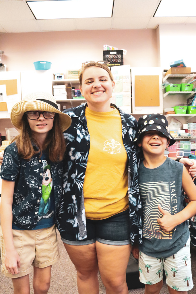 a teacher with two students