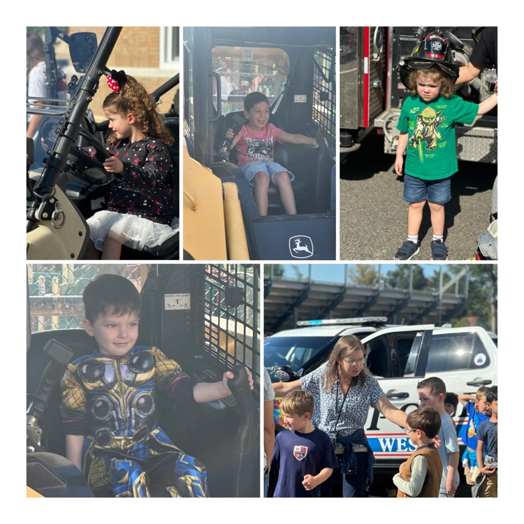 students enjoy vehicles at the Touch a Truck event.