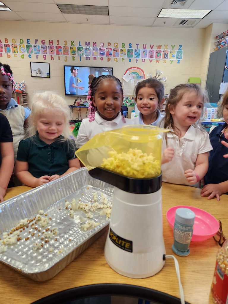 students watching popcorn pop