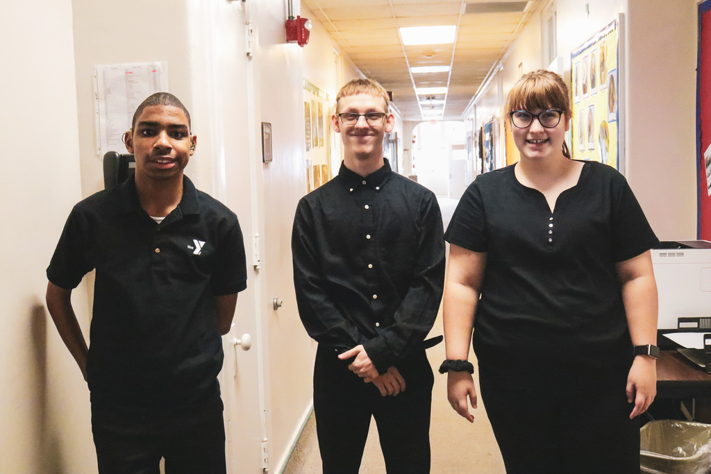 3 students with black outfits