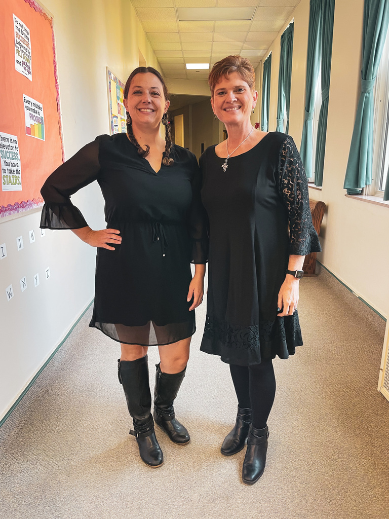 Two staff with black outfits