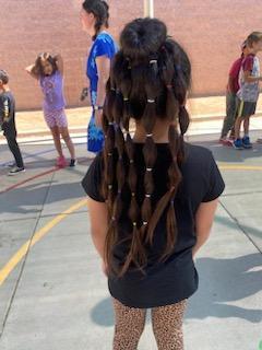 young girl's long hair with braids