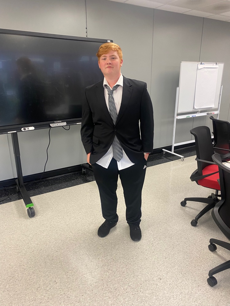 looking quite DAPPER!  suit, tie, shirt!  