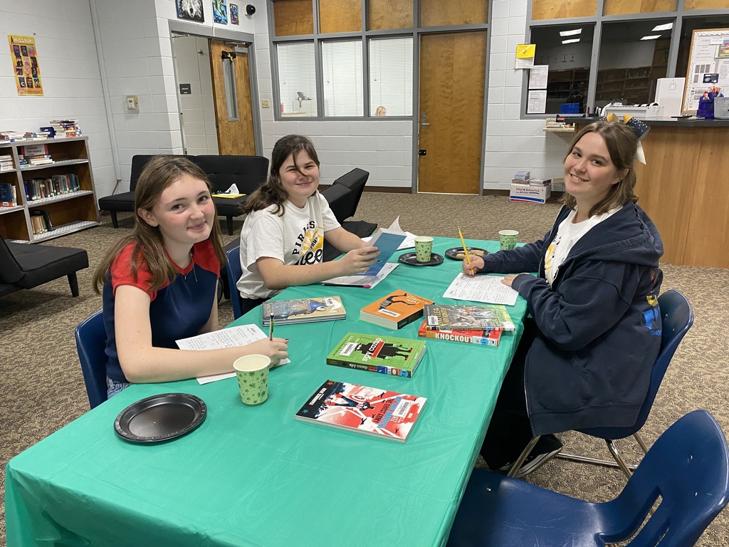 Students complete book tasting.