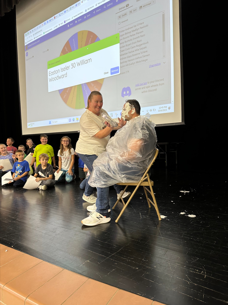 Principal Quintano getting pied in the face by Mrs. Pleiness, 5th grade teacher, for the class having positive behavior for the month of September. 