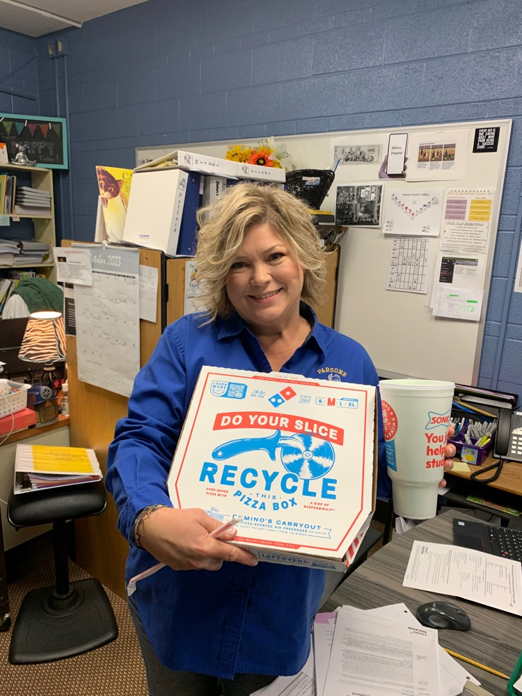 Ms. McCleary with her pizza and drink