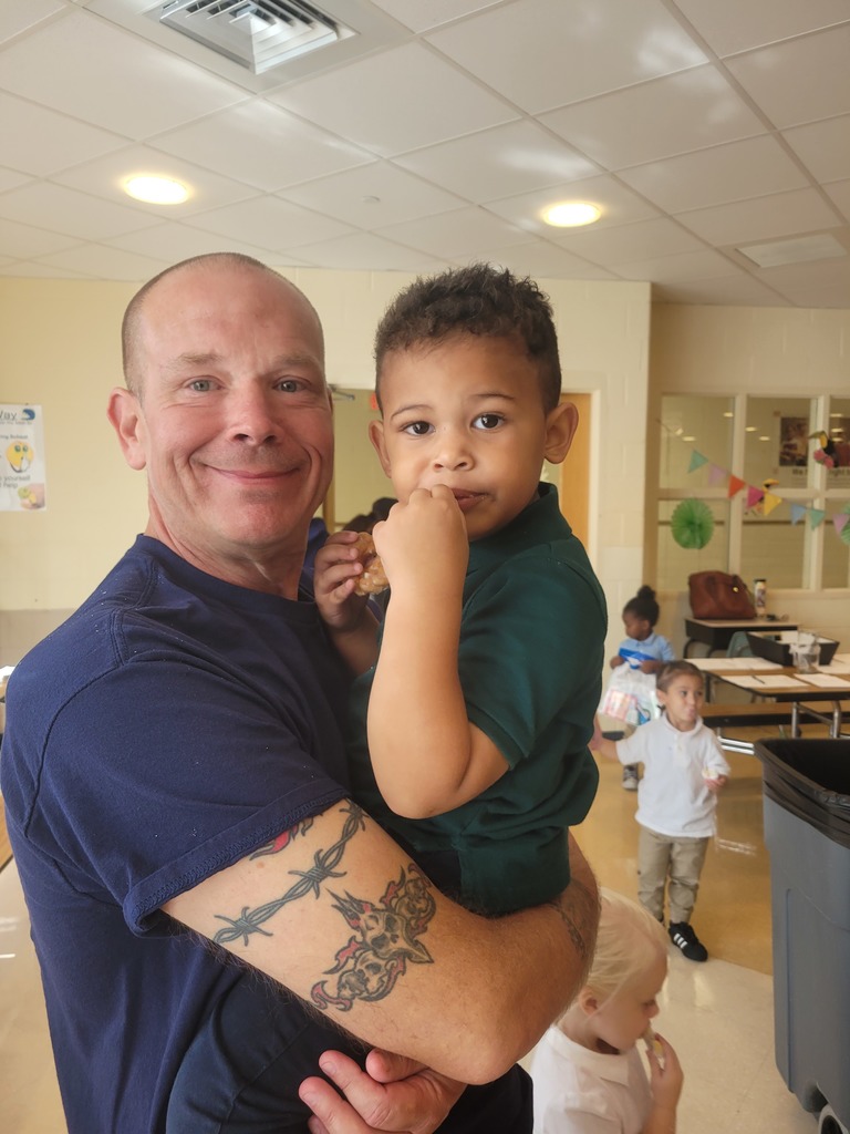 Parent and student posing for