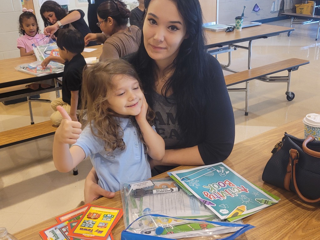 Mom and student sitting at table
